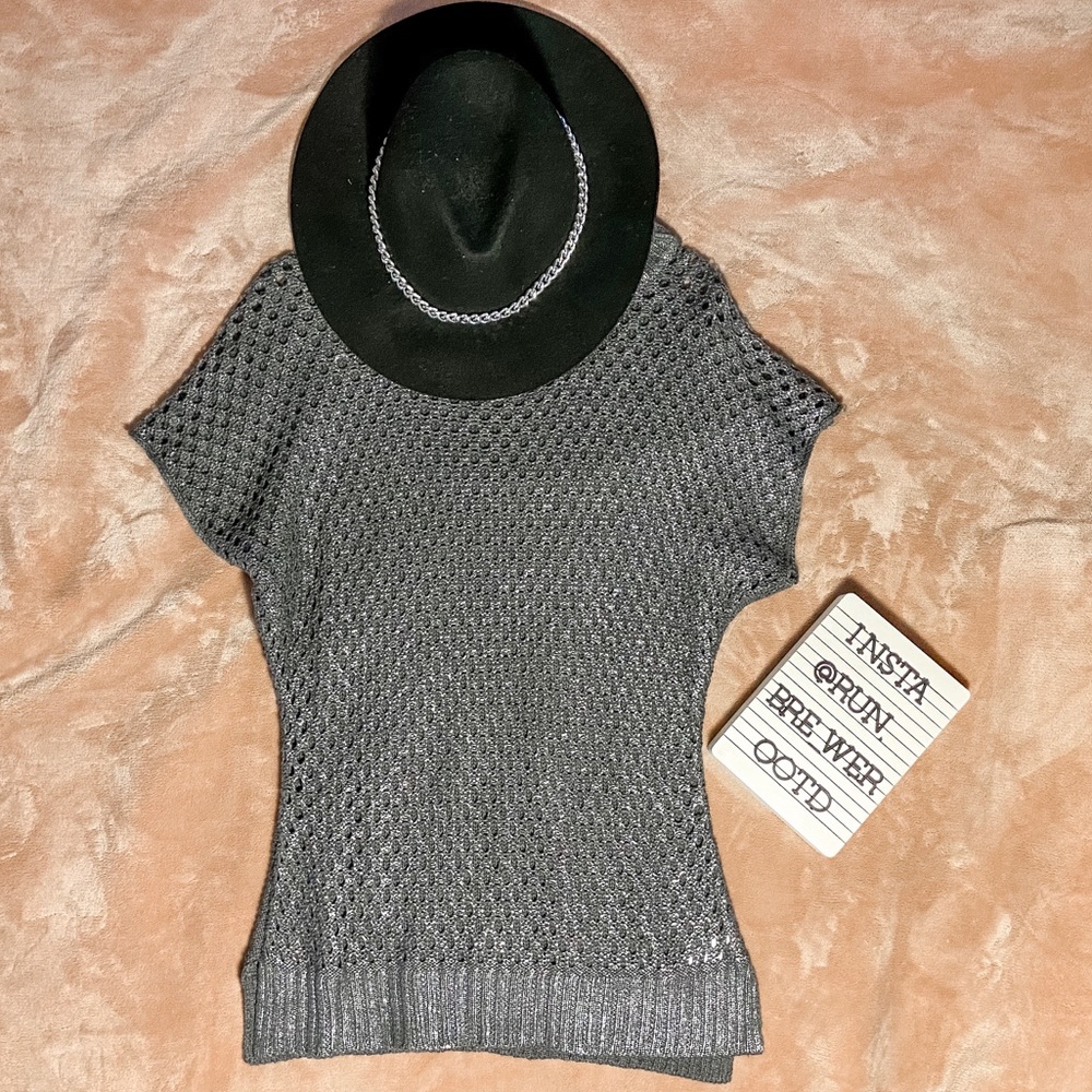 Sleeveless crochet sweater